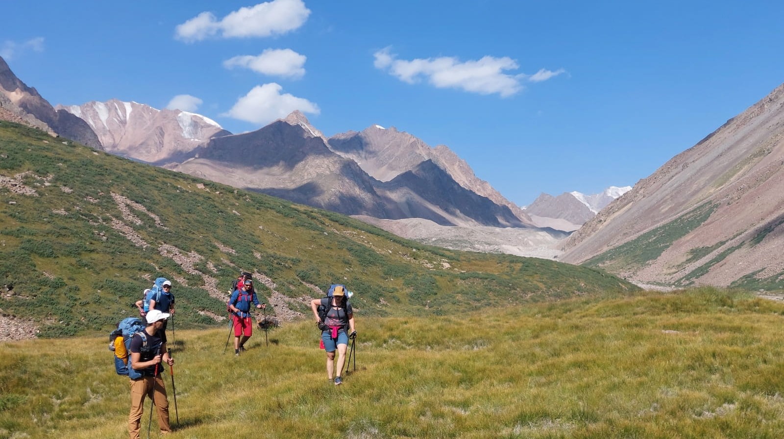 Trekkers hiking through Kazakhstans Mountains