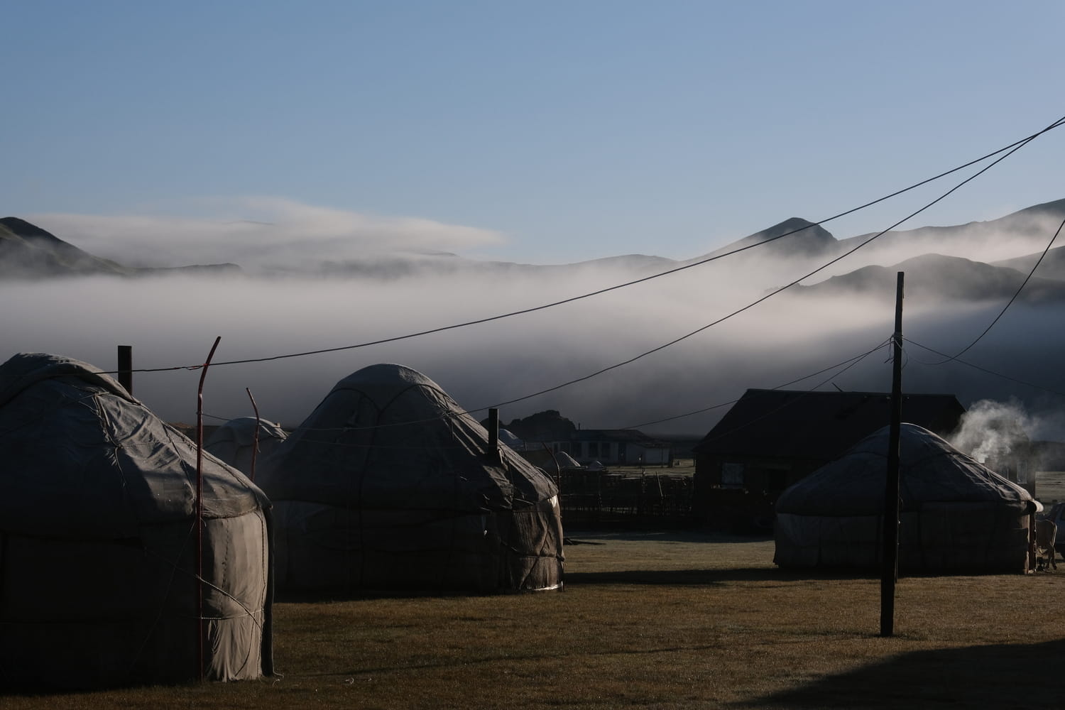 A typical yurt camp in rural Kyrgyzstan at sunrise in Naryn Province